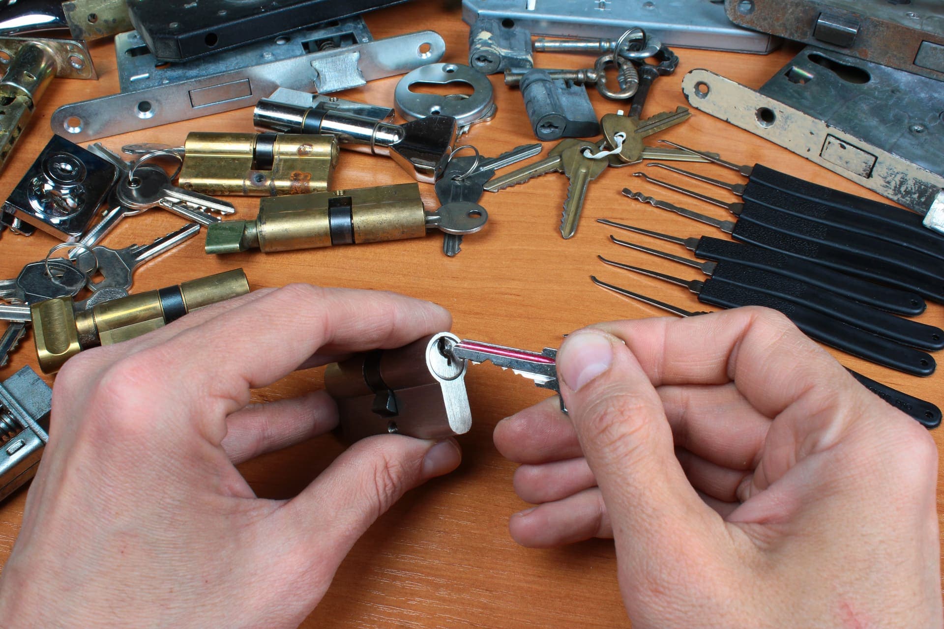 Locksmith working on vehicle lock